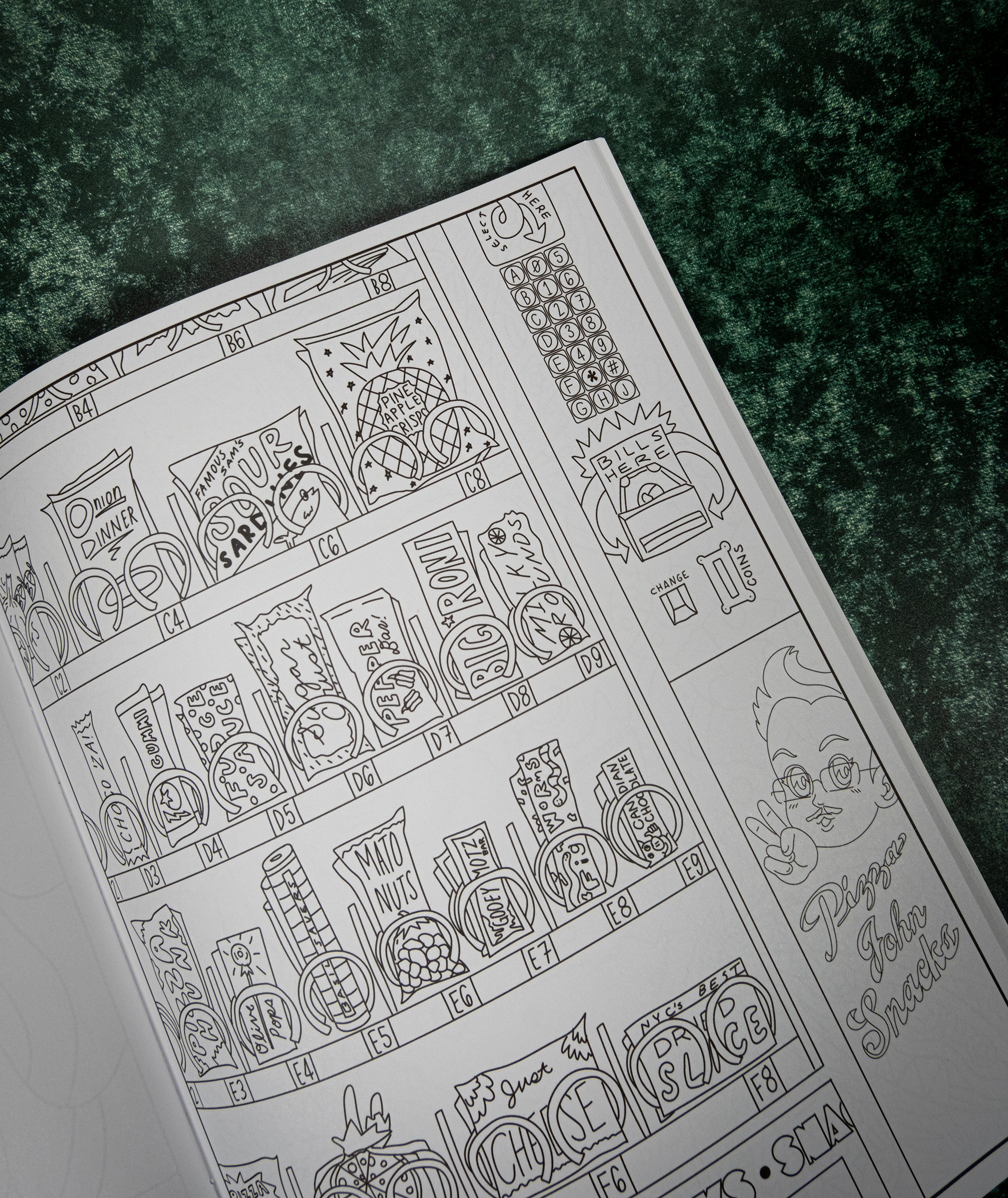 Coloring page of black line art of a snack machine on a textured green surfac