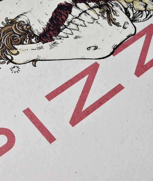 A close up of the word Pizza showing the grains of the card stock.